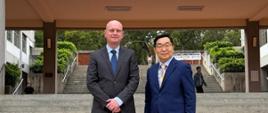 The Director of the Polish Office in Taipei together with the Director of Tunghai University in front of the university entrance